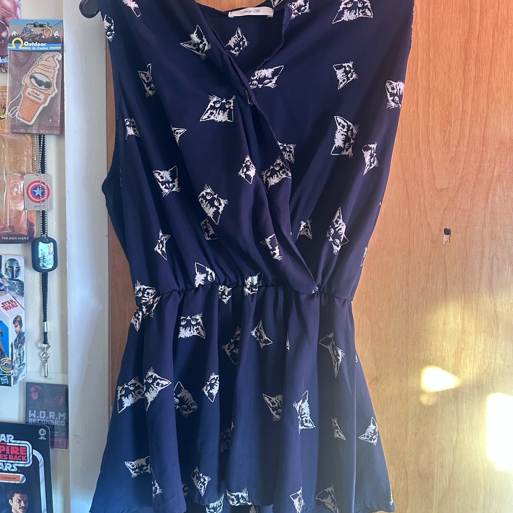 ModCloth Navy Blue Sleeveless /peplumTop with cat head Pattern